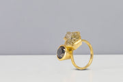 Todd Reed ring with a rough diamond (6.11ctw) and brilliant cut diamond (3.26ctw) in 18k yellow gold.